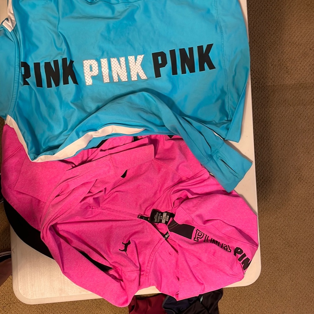Two pink tops small & med but both like small fit